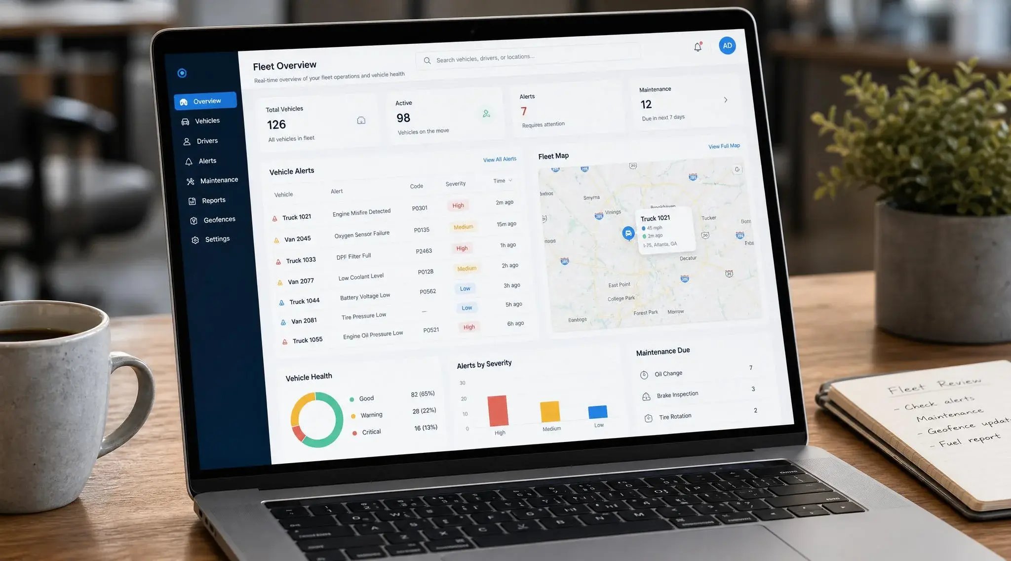 Fleet management platform displaying real-time vehicle alerts and OBD error codes on a telematics dashboard